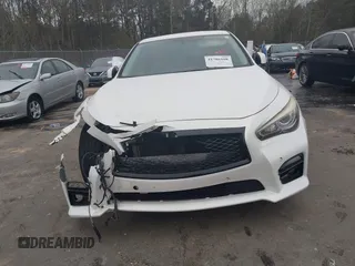 2015 Infiniti Q50 Premium z VIN JN1BV7AP9FM331131, wystawiony jako IAAI lot #41786108 z przebiegiem 176 874 mil mil oraz . Historia ofert i sprzedaży dostępna na DreamBid. Obrazek 12.