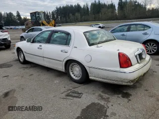 2001 Lincoln Town Car Executive z VIN 1LNHM81W91Y729914, wystawiony jako Copart lot #41593085 z przebiegiem 144 950 mil mil oraz Czysty tytuł • Clean title. Historia ofert i sprzedaży dostępna na DreamBid. Obrazek 2.