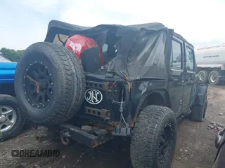 2008 Jeep Wrangler Unlimited X z VIN 1J4GA39138L641138, wystawiony jako IAAI lot #42376300 z przebiegiem 215 026 mil mil oraz . Historia ofert i sprzedaży dostępna na DreamBid. Obrazek 4.