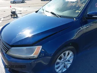 2011 Volkswagen Jetta SE with VIN 3VWDZ7AJ5BM319334, listed as a IAAI auction lot 42275321 with 111,989 mi miles and . Bid and sale history available at DreamBid. Image 18.