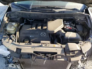 2015 Mazda CX-9 Grand Touring z VIN JM3TB3DV2F0456130, wystawiony jako Copart lot #60545095 z przebiegiem 120 892 mil mil oraz Szkoda całkowita • Salvage title. Historia ofert i sprzedaży dostępna na DreamBid. Obrazek 12.