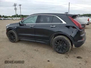 2019 Cadillac XT4 AWD Luxury with VIN 1GYFZBR43KF130284, listed as a Copart auction lot 67639354 with 79,245 mi miles and Non Repairable. Bid and sale history available at carsss.com. Image 2.