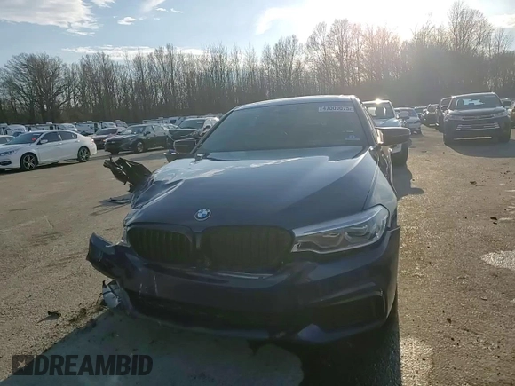 2020 BMW 5 Series M550i xDrive z VIN WBAJS7C06LBN95994, wystawiony jako Copart lot #47009075 z przebiegiem Nie podano mil oraz Szkoda całkowita • Salvage title. Historia ofert i sprzedaży dostępna na DreamBid. Obrazek 11.