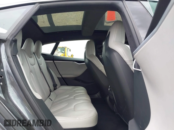 2016 Tesla Model S 90D with VIN 5YJSA1E27GF129824, listed as a IAAI auction lot 42058080 with 113,171 mi miles and . Bid and sale history available at DreamBid. Image 8.