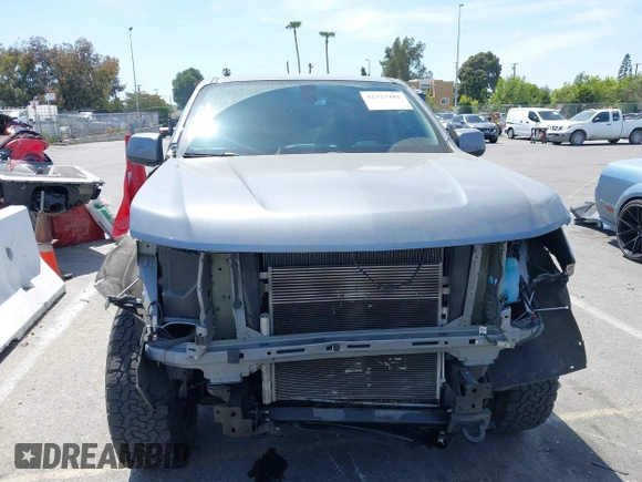 2022 Chevrolet Colorado 4WD Work Truck with VIN 1GCGTBEN2N1148111, listed as a IAAI auction lot 42327481 with 56,506 mi miles and . Bid and sale history available at DreamBid. Image 13.