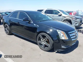 2011 Cadillac CTS Luxury with VIN 1G6DE5EY4B0110800, listed as a IAAI auction lot 42550513 with 116,393 mi miles and . Bid and sale history available at DreamBid. Image 1.