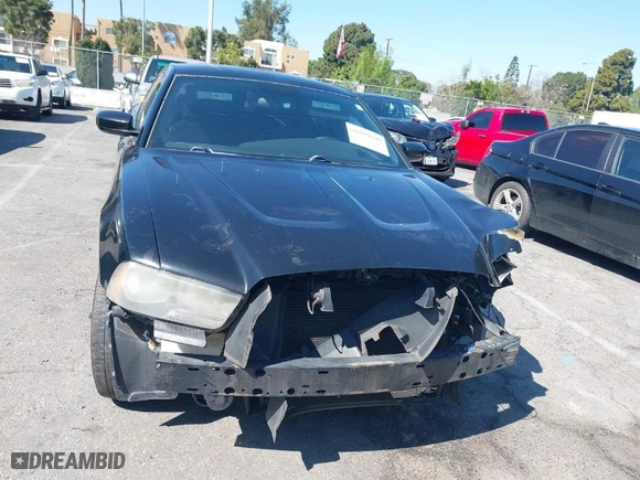 2013 Dodge Charger SE with VIN 2C3CDXBG5DH638674, listed as a IAAI auction lot 41692949 with 150,292 mi miles. Bid and sale history available at carsss.com. Image 12.