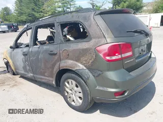 2019 Dodge Journey SE with VIN 3C4PDCBB4KT732026, listed as a IAAI auction lot 42177975 with Not provided miles and . Bid and sale history available at DreamBid. Image 3.