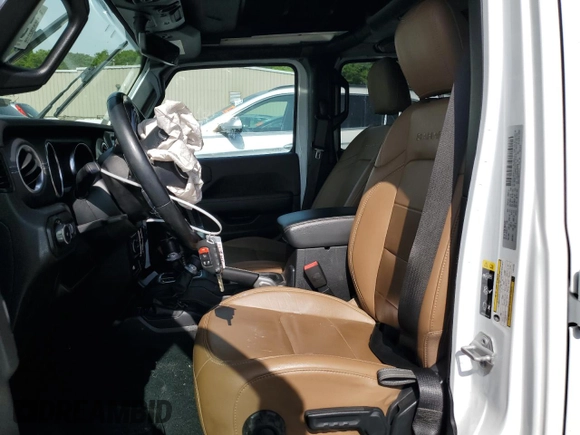 2020 Jeep Wrangler Unlimited Sahara with VIN 1C4HJXEG3LW243396, listed as a Copart auction lot 58709415 with 28,725 mi miles and Salvage title. Bid and sale history available at DreamBid. Image 7.