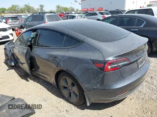 2023 Tesla Model 3 z VIN 5YJ3E1EA2PF569644, wystawiony jako IAAI lot #41831560 z przebiegiem 30 903 mil mil oraz . Historia ofert i sprzedaży dostępna na DreamBid. Obrazek 3.