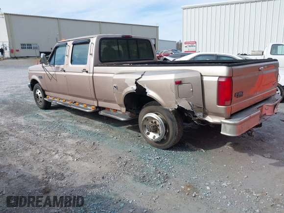 1997 Ford F-350 z VIN 1FTJW35G7VEC80262, wystawiony jako IAAI lot #38286107 z przebiegiem 158 206 mil mil oraz . Historia ofert i sprzedaży dostępna na DreamBid. Obrazek 14.