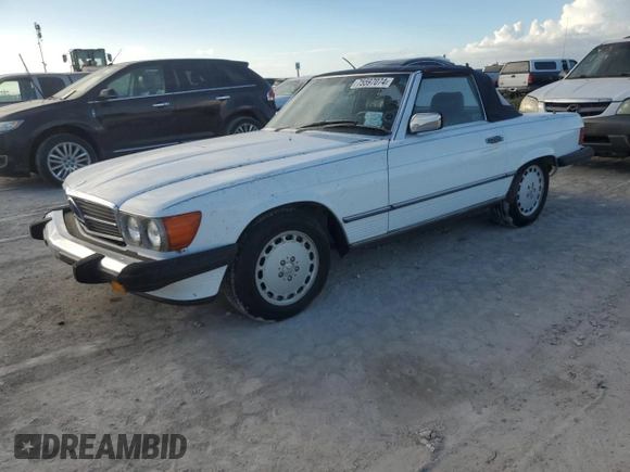 1989 Mercedes-Benz 560 SL z VIN WDBBA48DXKA096297, wystawiony jako Copart lot #75597074 z przebiegiem 70 152 mil mil oraz Szkoda całkowita • Salvage title. Historia ofert i sprzedaży dostępna na DreamBid. Obrazek 1.