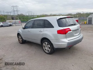 2009 Acura MDX Tech/Entertainment Pkg with VIN 2HNYD28429H523839, listed as a IAAI auction lot 42086231 with 203,211 mi miles. Bid and sale history available at carsss.com. Image 3.