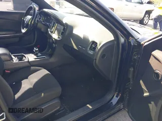 2012 Dodge Charger SXT with VIN 2C3CDXHG2CH258844, listed as a IAAI auction lot 42025908 with 214,529 mi miles. Bid and sale history available at carsss.com. Image 5.