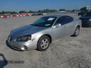 2007 Pontiac Grand Prix with VIN 2G2WP552071153266, listed as a IAAI auction lot 41986172 with 227,909 mi miles. Bid and sale history available at carsss.com. Image 2.