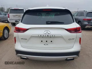 2021 Infiniti QX50 Essential z VIN 3PCAJ5CA0MF102828, wystawiony jako IAAI lot #41520222 z przebiegiem 66 264 mil mil oraz . Historia ofert i sprzedaży dostępna na DreamBid. Obrazek 16.