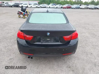 2015 BMW 4 Series 428i with VIN WBA3N3C55FK232319, listed as a IAAI auction lot 42136421 with 140,300 mi miles and . Bid and sale history available at DreamBid. Image 16.