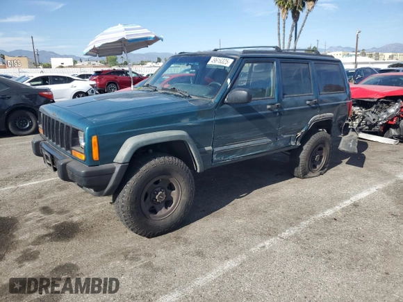 1997 Jeep Cherokee Sport with VIN 1J4FT68S4VL545385, listed as a Copart auction lot 49616325 with 239,798 mi miles and Salvage Title. Bid and sale history available at carsss.com. Image 1.