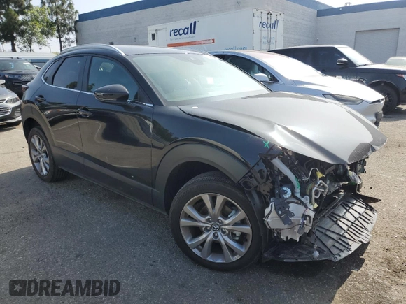 2023 Mazda CX-30 S Select with VIN 3MVDMBBM7PM582394, listed as a Copart auction lot 59786415 with Not provided miles and Salvage title. Bid and sale history available at DreamBid. Image 4.