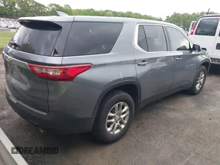 2020 Chevrolet Traverse LS with VIN 1GNERFKW5LJ245009, listed as a IAAI auction lot 42029854 with 77,771 mi miles and . Bid and sale history available at DreamBid. Image 4.