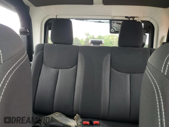 2018 Jeep Wrangler Sahara with VIN 1C4AJWBG2JL852087, listed as a Copart auction lot 54380935 with 49,287 mi miles and Salvage title. Bid and sale history available at DreamBid. Image 10.