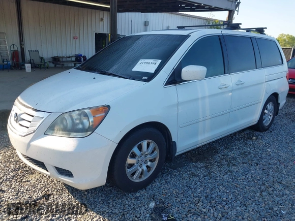 2009 Honda Odyssey EX-L with VIN 5FNRL38799B404379, listed as a IAAI auction lot 41990398 with 224,859 mi miles and . Bid and sale history available at DreamBid. Image 2.