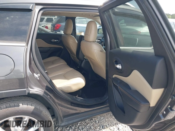 2015 Jeep Cherokee Limited with VIN 1C4PJLDS9FW516548, listed as a IAAI auction lot 42108725 with 122,190 mi miles and . Bid and sale history available at DreamBid. Image 8.