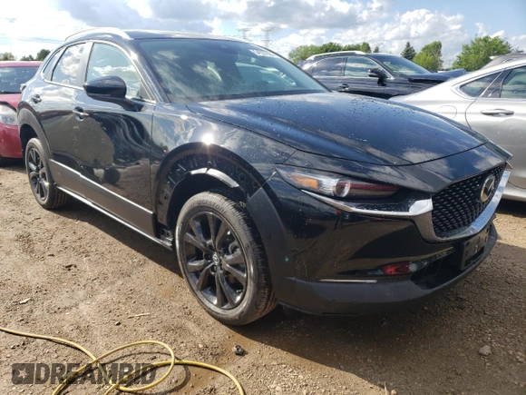 2022 Mazda CX-30 2.5 Turbo with VIN 3MVDMBAY0NM447128, listed as a Copart auction lot 54007924 with 10,596 mi miles and Salvage Title. Bid and sale history available at DreamBid. Image 4.