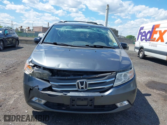 2011 Honda Odyssey Touring Elite with VIN 5FNRL5H96BB043339, listed as a IAAI auction lot 42174767 with 161,233 mi miles and . Bid and sale history available at DreamBid. Image 12.