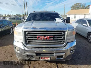 2015 GMC Sierra 2500HD available WiFi SLT with VIN 1GT12ZEG7FF167096, listed as a IAAI auction lot 41408317 with 152,969 mi miles. Bid and sale history available at carsss.com. Image 12.