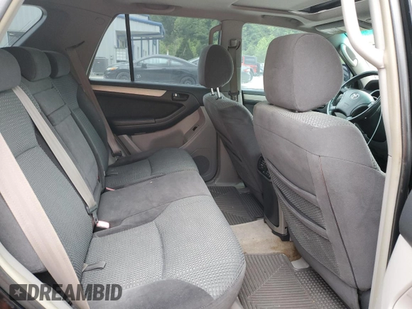 2004 Toyota 4Runner SR5 z VIN JTEBU14R040030242, wystawiony jako Copart lot #57831435 z przebiegiem 223 883 mil mil oraz Szkoda całkowita • Salvage title. Historia ofert i sprzedaży dostępna na DreamBid. Obrazek 11.