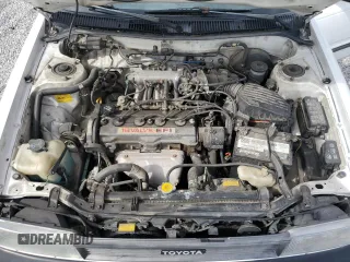 1990 Toyota Corolla z VIN 1NXAE94A0LZ089770, wystawiony jako Copart lot #75318334 z przebiegiem 161 894 mil mil oraz Szkoda całkowita • Salvage title. Historia ofert i sprzedaży dostępna na DreamBid. Obrazek 13.