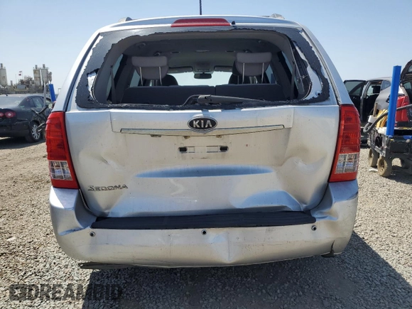 2012 Kia Sedona LX with VIN KNDMG4C72C6445242, listed as a Copart auction lot 54164455 with 143,124 mi miles and Salvage Title. Bid and sale history available at carsss.com. Image 6.