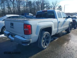 2019 GMC Sierra 1500 Limited SLE with VIN 2GTV2MEC8K1237210, listed as a IAAI auction lot 41354434 with 164,999 mi miles. Bid and sale history available at carsss.com. Image 4.