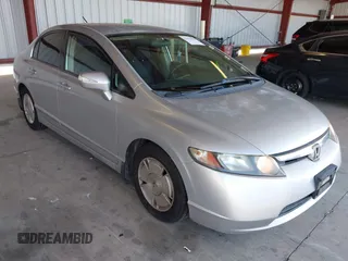 2006 Honda Civic z VIN JHMFA36236S027805, wystawiony jako IAAI lot #42370381 z przebiegiem 226 183 mil mil oraz . Historia ofert i sprzedaży dostępna na DreamBid. Obrazek 1.
