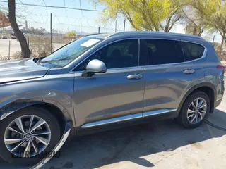 2019 Hyundai Santa Fe SEL Plus z VIN 5NMS33AD6KH099865, wystawiony jako IAAI lot #42007106 z przebiegiem 103 095 mil mil oraz . Historia ofert i sprzedaży dostępna na DreamBid. Obrazek 14.