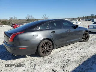 2012 Jaguar XJ with VIN SAJWA1CB1CLV31450, listed as a Copart auction lot 46883875 with 150,268 mi miles and Salvage Title. Bid and sale history available at DreamBid. Image 3.