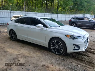 2020 Ford Fusion Titanium with VIN 3FA6P0D96LR152910, listed as a Copart auction lot 55389355 with 105,690 mi miles and Salvage title. Bid and sale history available at DreamBid. Image 4.