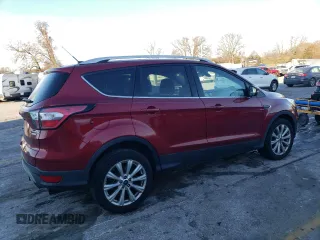 2017 Ford Escape Titanium with VIN 1FMCU0JD7HUD41107, listed as a Copart auction lot 85657084 with 197,982 mi miles and Salvage Title. Bid and sale history available at DreamBid. Image 3.