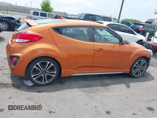 2016 Hyundai Veloster Turbo z VIN KMHTC6AE8GU302247, wystawiony jako IAAI lot #42619624 z przebiegiem 35 112 mil mil oraz . Historia ofert i sprzedaży dostępna na DreamBid. Obrazek 13.