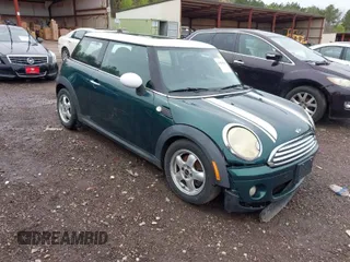 2009 MINI Cooper Hardtop with VIN WMWMF33579TW72493, listed as a IAAI auction lot 41861584 with 136,341 mi miles. Bid and sale history available at carsss.com. Image 1.