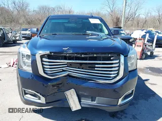 2017 GMC Yukon SLT with VIN 1GKS1BKC9HR356600, listed as a IAAI auction lot 41694218 with 155,855 mi miles. Bid and sale history available at carsss.com. Image 12.