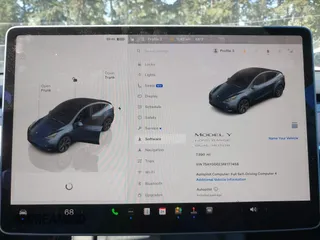 2024 Tesla Model Y Long Range with VIN 7SAYGDEE3RF177458, listed as a IAAI auction lot 42109641 with 7,890 mi miles. Bid and sale history available at carsss.com. Image 7.