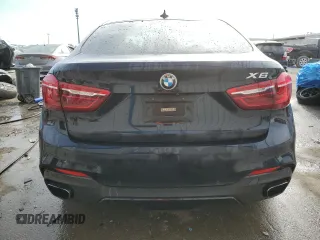 2015 BMW X6 xDrive50i with VIN 5UXKU6C56F0F93641, listed as a Copart auction lot 77233553 with 71,409 mi miles. Bid and sale history available at carsss.com. Image 6.