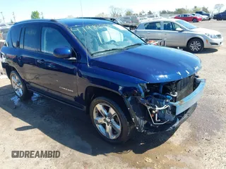 2014 Jeep Compass Latitude with VIN 1C4NJCEB2ED883243, listed as a IAAI auction lot 41989007 with 138,192 mi miles. Bid and sale history available at carsss.com. Image 1.