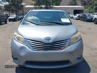 2015 Toyota Sienna XLE with VIN 5TDYK3DC0FS589947, listed as a IAAI auction lot 36567379 with 130,969 mi miles and . Bid and sale history available at DreamBid. Image 13.