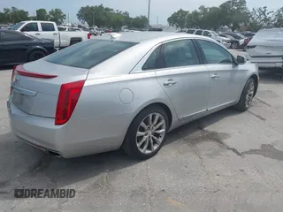 2017 Cadillac XTS Luxury with VIN 2G61M5S30H9138185, listed as a IAAI auction lot 42081983 with 110,176 mi miles. Bid and sale history available at carsss.com. Image 4.