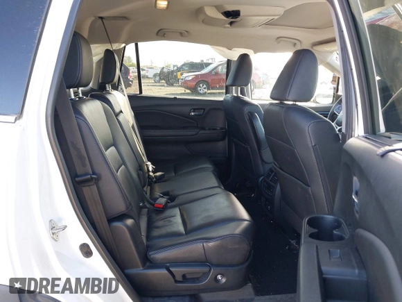 2021 Honda Pilot Touring 8-Passenger with VIN 5FNYF6H92MB031782, listed as a IAAI auction lot 42087322 with 70,062 mi miles and . Bid and sale history available at DreamBid. Image 8.