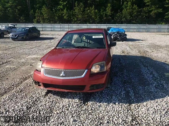 2010 Mitsubishi Galant FE z VIN 4A32B2FF1AE008717, wystawiony jako Copart lot #56575015 z przebiegiem 80 862 mil mil oraz Szkoda całkowita • Salvage title. Historia ofert i sprzedaży dostępna na DreamBid. Obrazek 13.