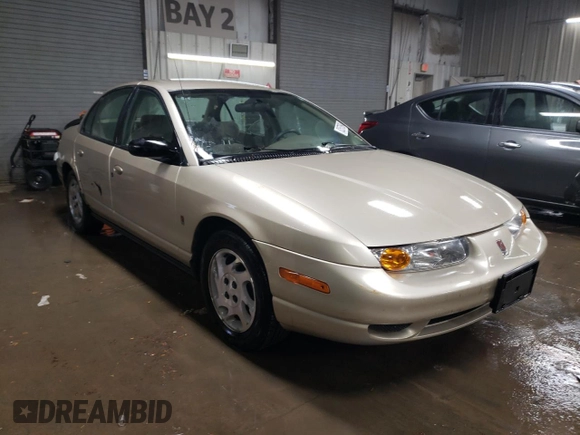 2000 Saturn SL with VIN 1G8ZK5278YZ269342, listed as a Copart auction lot 82573694 with 53,641 mi miles and Salvage title. Bid and sale history available at DreamBid. Image 4.